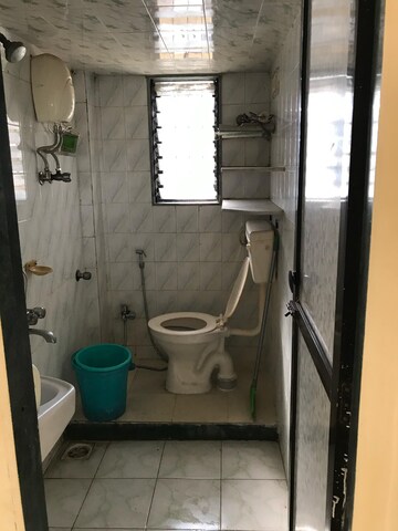 Bathroom in 2 BHK Apartment at Gokuldham Saidham CHS, Goregaon East – for Rent