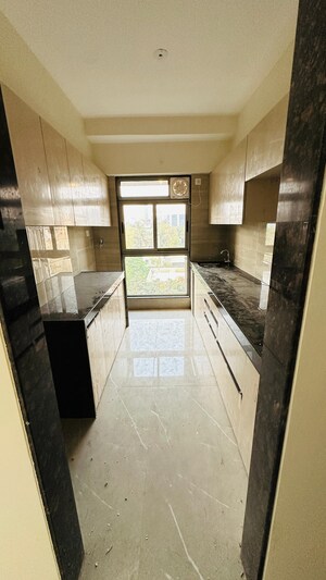 Kitchen in 2 BHK Apartment at Charkop Industrial Estate – for Sale