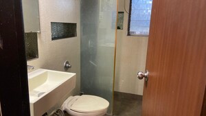 Bathroom in 3 BHK Apartment at Evershine Greens, Andheri West – for Rent