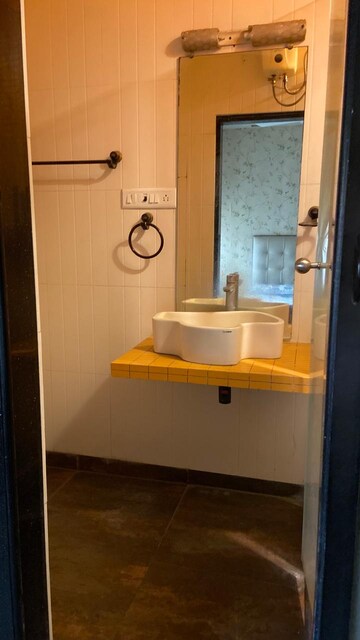 Bathroom in 3 BHK Apartment at Evershine Greens, Andheri West – for Rent
