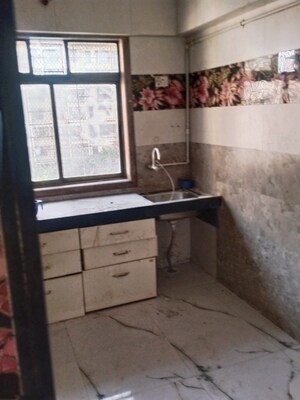 Kitchen in 2 BHK Apartment at Coast Kalpana Gardens, Nalasopara East – for Sale