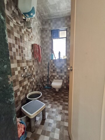 Bathroom in 2 BHK Apartment at Shrinivas Crossover County B Wing, Sinhagad Road – for Sale