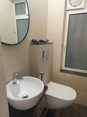 Bathroom in 1 BHK Apartment at Omkar Signet, Malad East – for Rent
