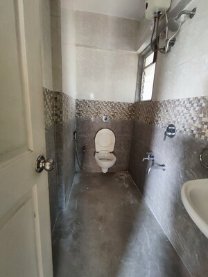Bathroom in 1 BHK Apartment at Cosmos 27 Gbr, Kasarvadavali – for Rent