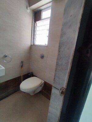 Bathroom in 1 BHK Apartment at Cosmos 27 Gbr, Kasarvadavali – for Rent
