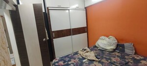 Bedroom in 1 BHK Apartment at New Gurukripa CHS, Vishnu Nagar – for Sale