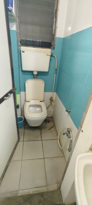 Bathroom in 1 BHK Apartment at New Gurukripa CHS, Vishnu Nagar – for Sale