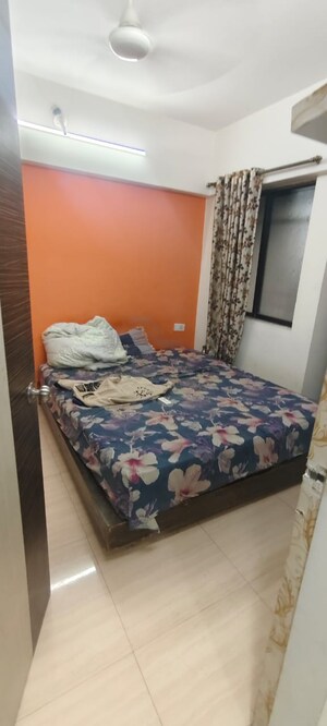 Bedroom in 1 BHK Apartment at New Gurukripa CHS, Vishnu Nagar – for Sale