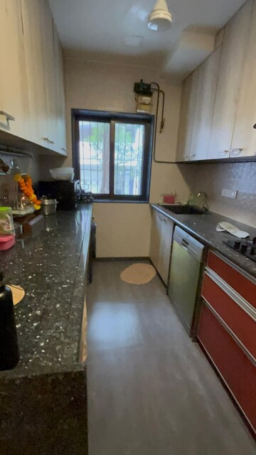 Kitchen in 2 BHK Apartment at Raj Tilak Apartment, Versova – for Rent
