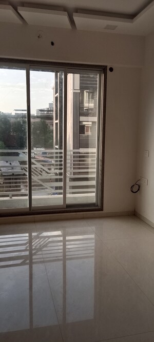 Room in 2.5 BHK Apartment at Kalyan West – for Sale