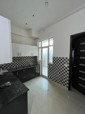 Living Room in 2 BHK Apartment at Galaxy North Avenue, Gaur City 1 – for Sale