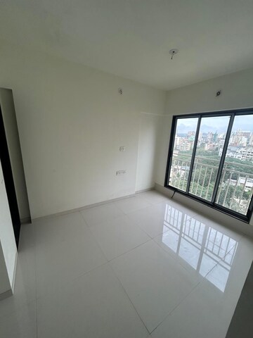 Master Bedroom in 1 BHK Apartment at Oxford Navrang Crystal, Goregaon West – for Rent