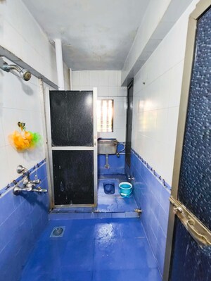 Bathroom in 2 BHK Apartment at Eden Woods complex, Manpada – for Sale