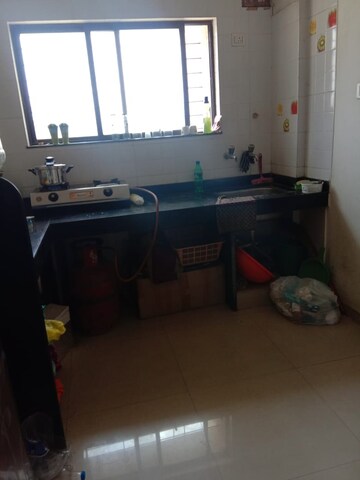 Kitchen in 1 BHK Apartment at Sarthak Keshar, Wagholi – for Sale