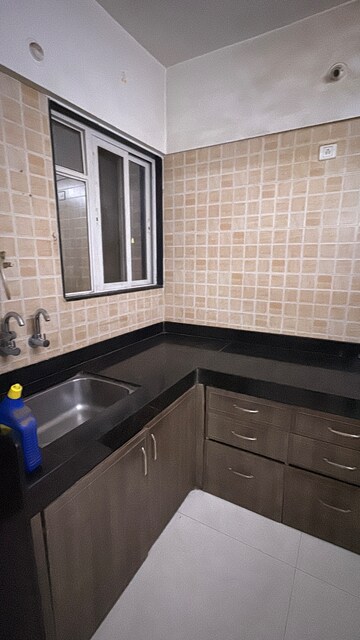 Kitchen in 2 BHK Apartment at GK Silverland Residency Phase 3, Ravet – for Rent