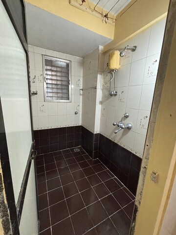 Bathroom in 1 RK Apartment at Raj Tarang, Dahisar East – for Rent