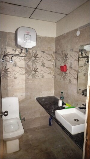 Bathroom in 1 BHK Apartment at Paramount Golfforeste, Zeta I Greater Noida – for Rent