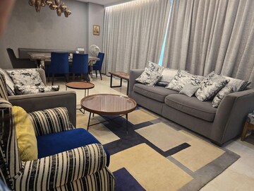 Living Room in 6 BHK Apartment at Oberoi Realty Esquire, Goregaon East – for Sale