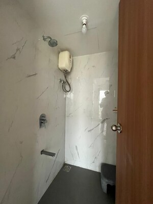 Bathroom in 1 BHK Apartment at Lodha Codename Premier, Dombivli East – for Rent