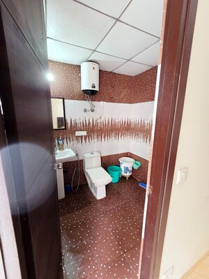 Bathroom in 3 BHK Apartment at Land Craft Golf Links Apartment Phase 2, Pandav Nagar – for Sale