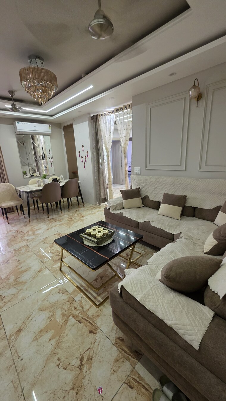 Living Room, land-craft-golf-links-apartment-phase-2 3 Bedroom 2000 Sq.Ft. Apartment In Pandav Nagar Ghaziabad 9283579