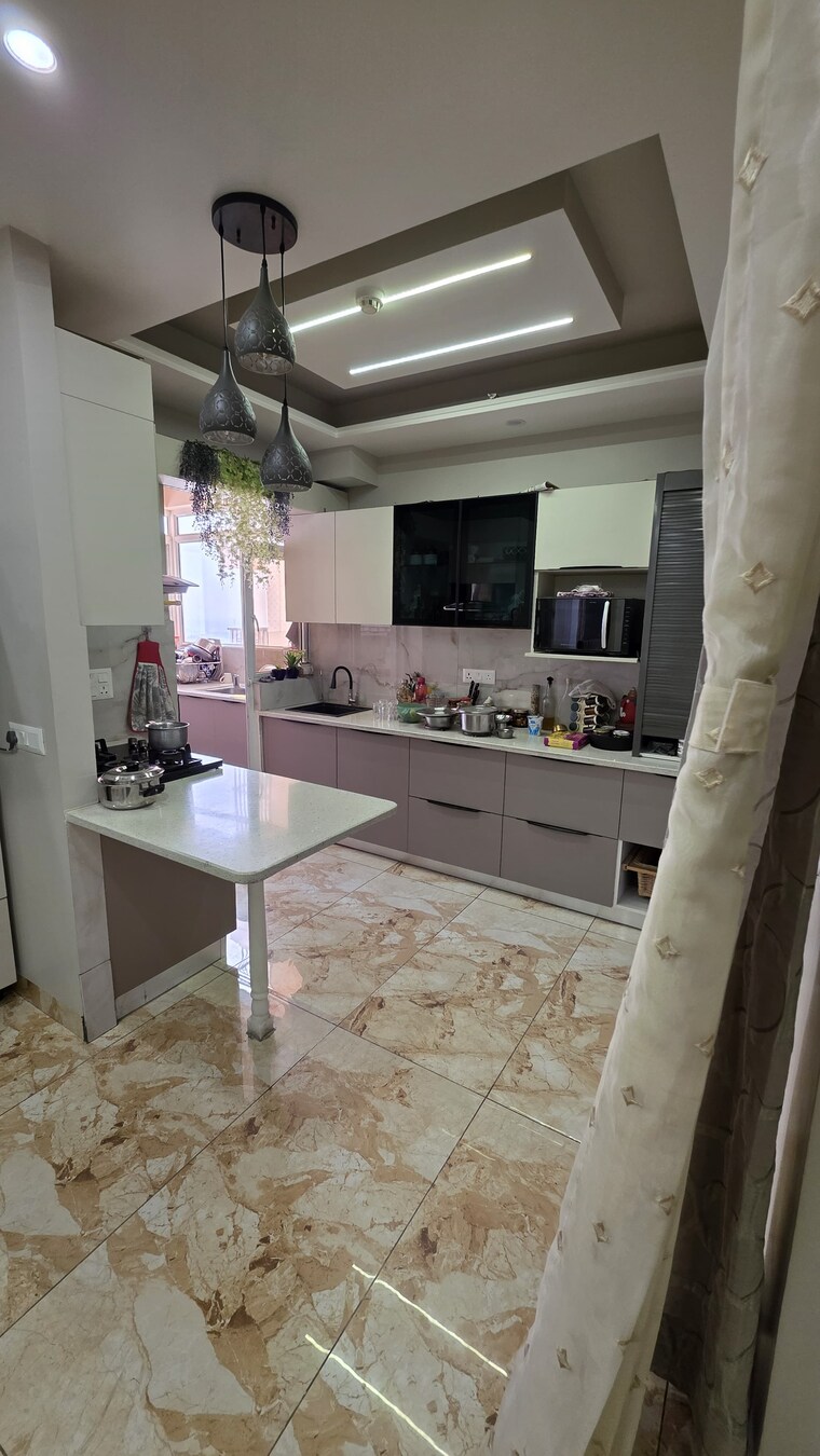 Kitchen, land-craft-golf-links-apartment-phase-2 3 Bedroom 2000 Sq.Ft. Apartment In Pandav Nagar Ghaziabad 9283579