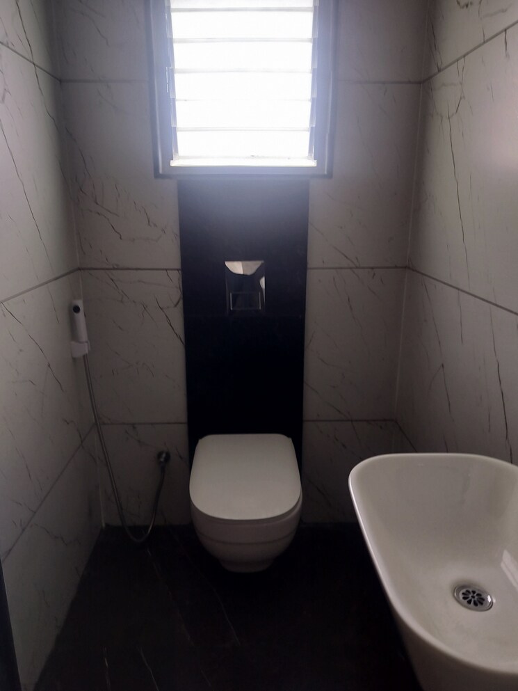 Bathroom, pawar-riseonic 2 Bedroom 794 Sq.Ft. Apartment In Mundhwa Pune 9283622