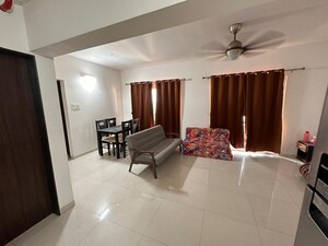 Living Room in 2 BHK Apartment at Puranik Abitante, Bavdhan – for Sale