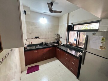 Kitchen in 1 BHK Apartment at Nirman Shilpa Apartment, Vashi Sector 12 – for Sale