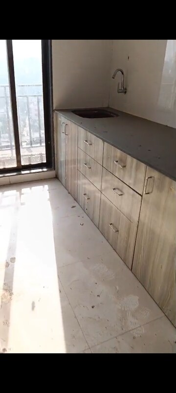 Kitchen in 2 BHK Apartment at Prithvi Pride, Mira Road – for Sale