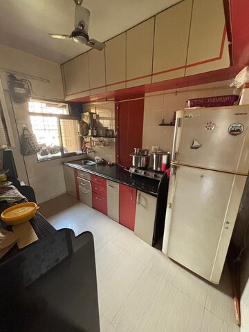 Kitchen in 2 BHK Apartment at Parshwanath Galaxy, Ghodbunder Road – for Rent