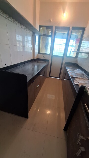 Kitchen in 3 BHK Apartment at HDIL Metropolis Residences, Andheri West – for Sale