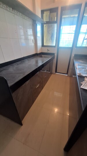 Kitchen in 3 BHK Apartment at HDIL Metropolis Residences, Andheri West – for Sale