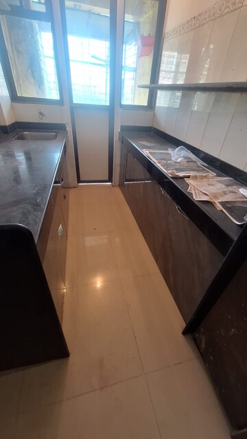 Kitchen in 3 BHK Apartment at HDIL Metropolis Residences, Andheri West – for Sale