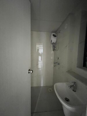 Bathroom in 1 BHK Apartment at Runwal Gardens, Dombivli East – for Rent