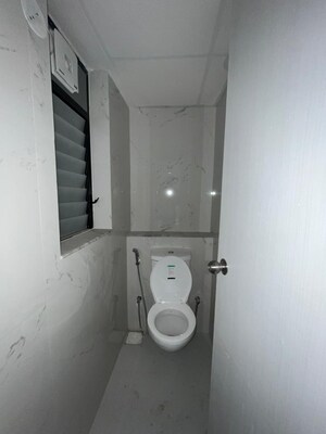 Bathroom in 1 BHK Apartment at Runwal Gardens, Dombivli East – for Rent