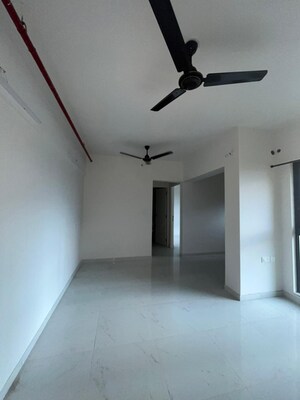 Living Room in 1 BHK Apartment at Runwal Gardens, Dombivli East – for Rent