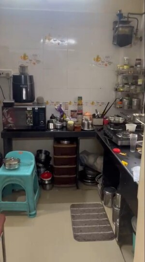 Kitchen in 1 BHK Apartment at Aditya Prasad CHS, Mira Road – for Sale