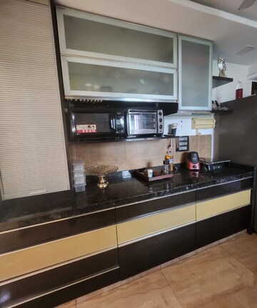 Kitchen in 3 BHK Apartment at Hiranandani Meadows, Manpada – for Rent