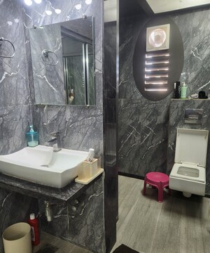 Bathroom in 3 BHK Apartment at Hiranandani Meadows, Manpada – for Rent