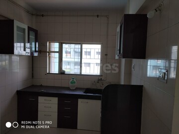 Kitchen in 2 BHK Apartment at Kumar Primavera, Wadgaon Sheri – for Sale