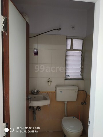 Bathroom in 2 BHK Apartment at Kumar Primavera, Wadgaon Sheri – for Sale