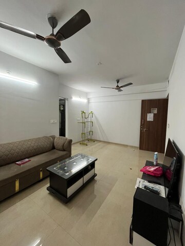 Living Room in 2 BHK Apartment at Lodha Palava Downtown, Dombivli East – for Rent