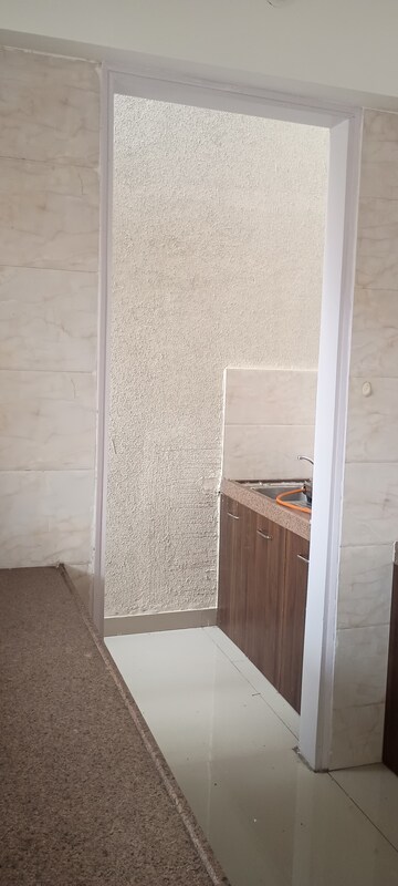 Kitchen in 2 BHK Apartment at Benchmark Cyprus, Punawale – for Rent