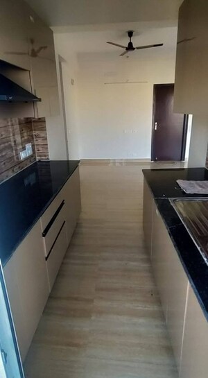 Kitchen in 2 BHK Apartment at Amrapali Terrace Homes, Tech Zone 4 Greater Noida – for Rent