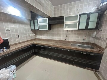 Kitchen in 3 BHK Apartment at Raja Shri Sapta Ratna Chs, Sunder Nagar – for Rent
