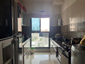 Kitchen in 2 BHK Apartment at Rajesh Raj Infinia, Malad West – for Rent