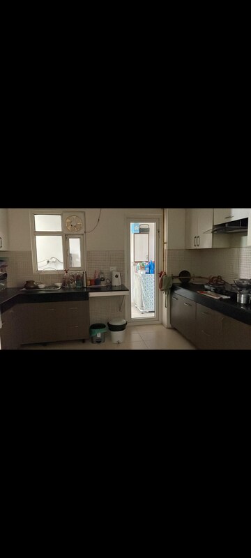 Kitchen in 4 BHK Apartment at Antriksh Golf View, Sector 78 – for Rent