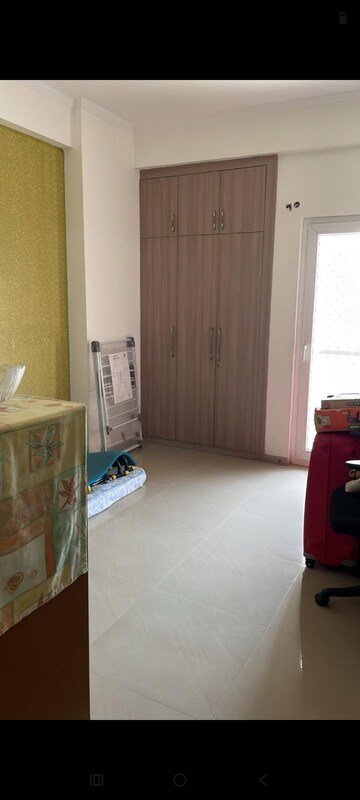 Living Room in 4 BHK Apartment at Antriksh Golf View, Sector 78 – for Rent