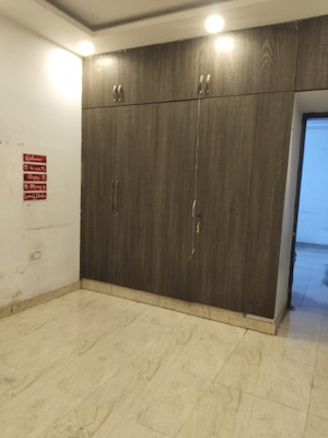 Bedroom in 4 BHK Builder Floor at Ambience Multi Unit Residential Apartments, Jasola – for Rent